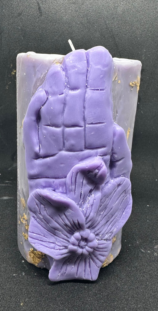 Purple and gold pillar candle